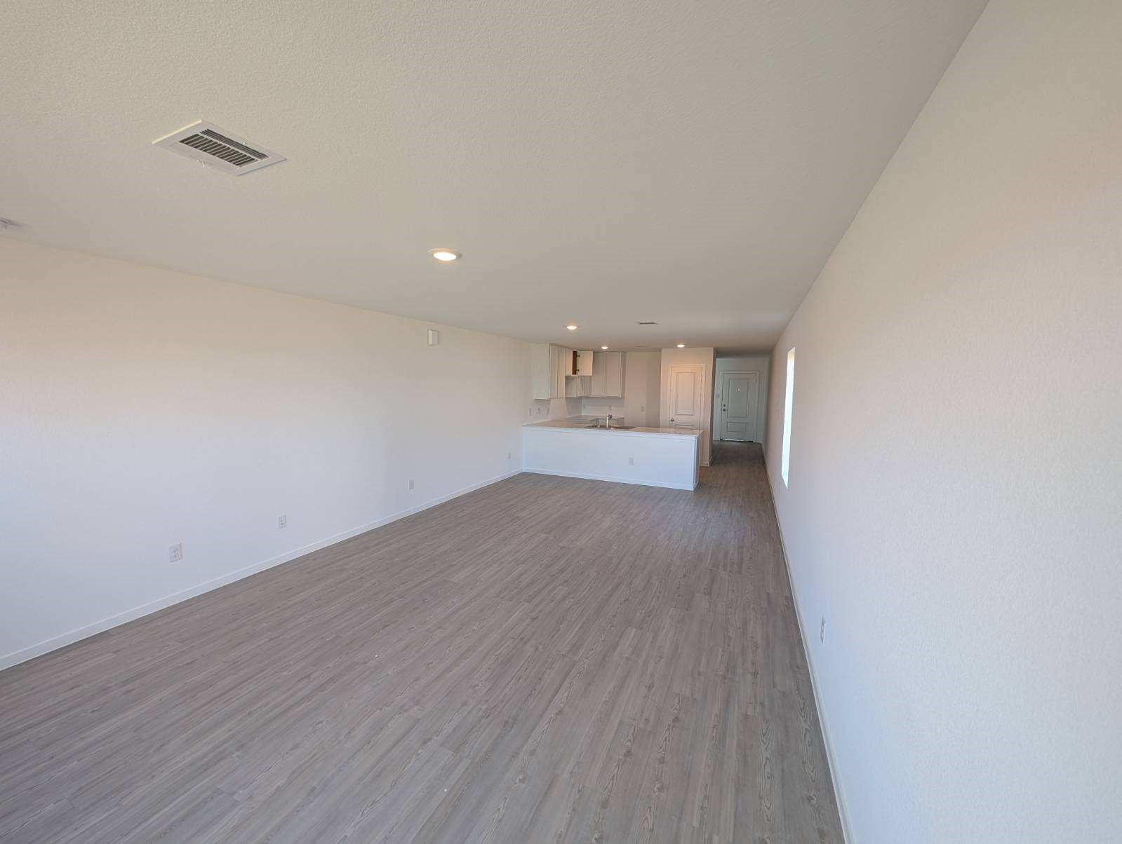 2927 Summer Breeze Way Angleton, TX 77515 - Photo 5 of 16 a view of empty room with wooden floor