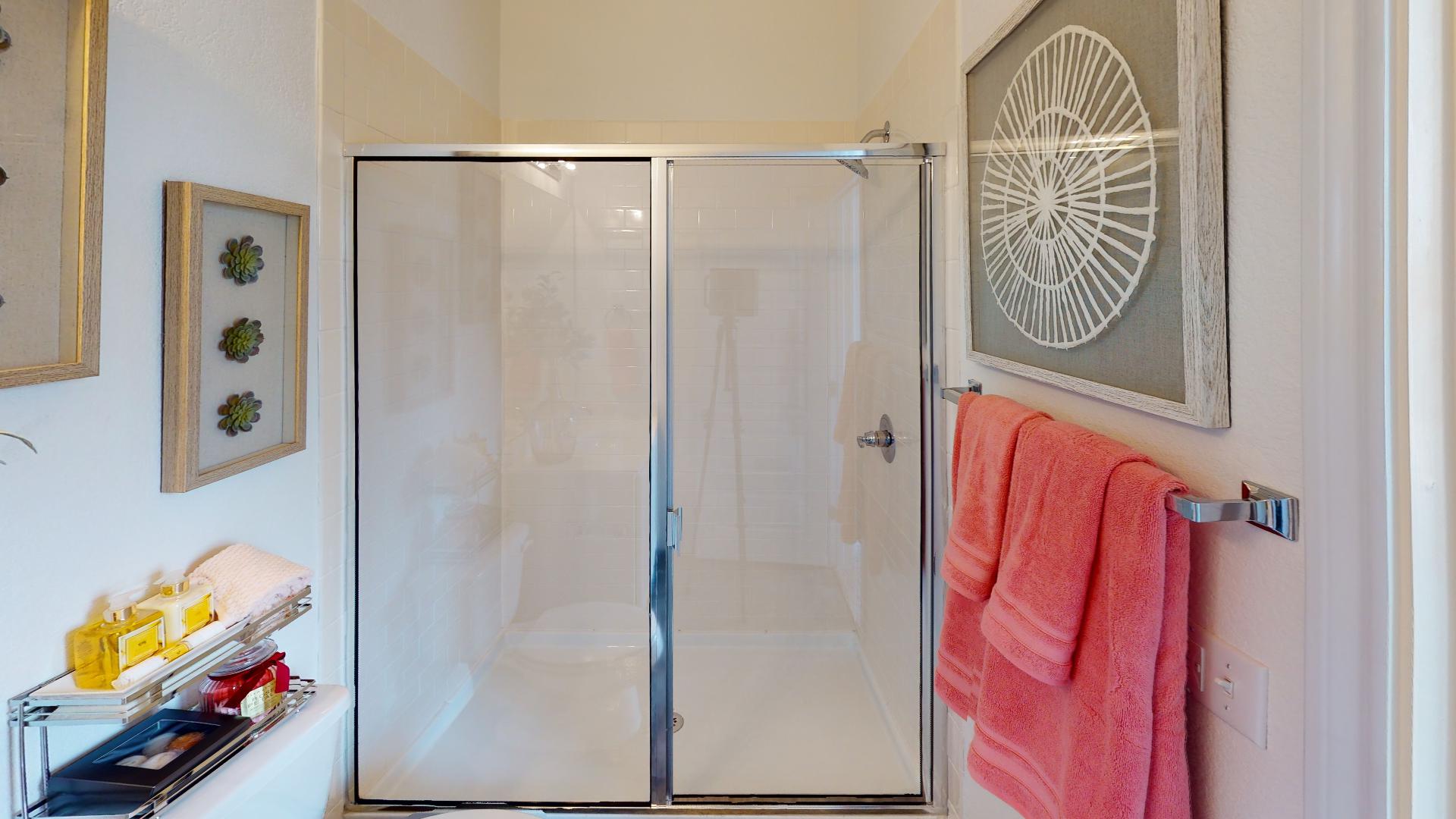 8211 Springsteen Drive Austin, TX 78744 - Photo 7 of 10 Full bathroom featuring a shower stall