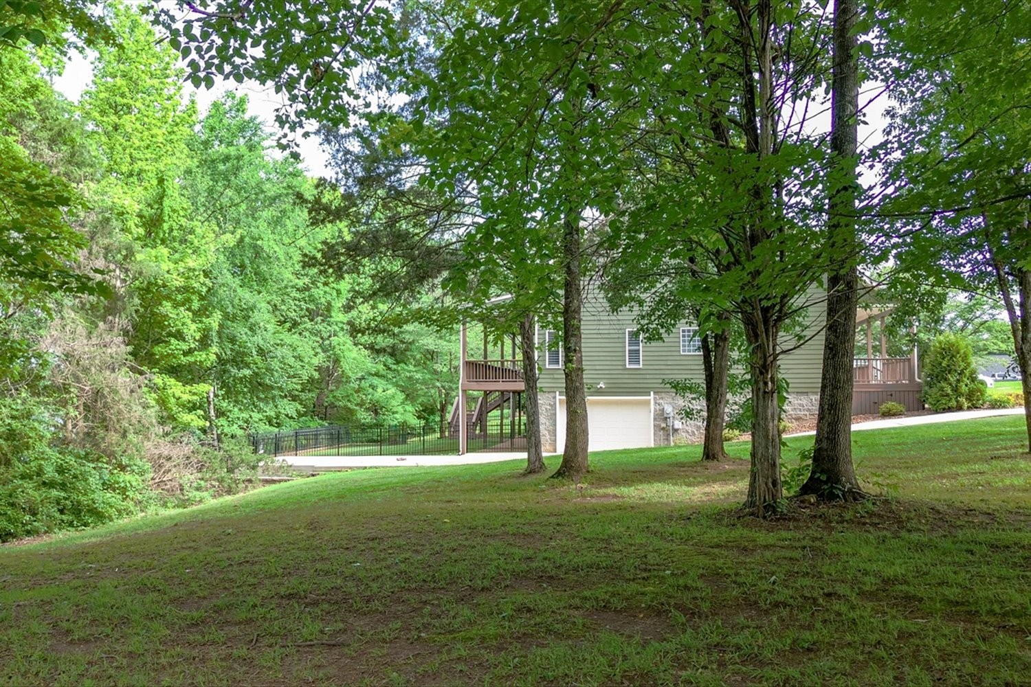 6 Cypress Point Drive Winchester, TN 37398 - Photo 27 of 58 a big yard with lots of green space and trees