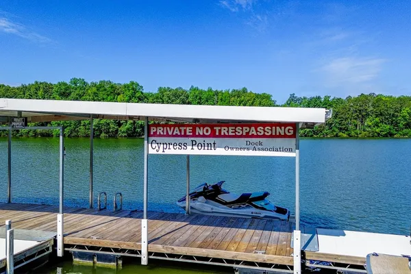 a view of a outdoor space with seating area and garden