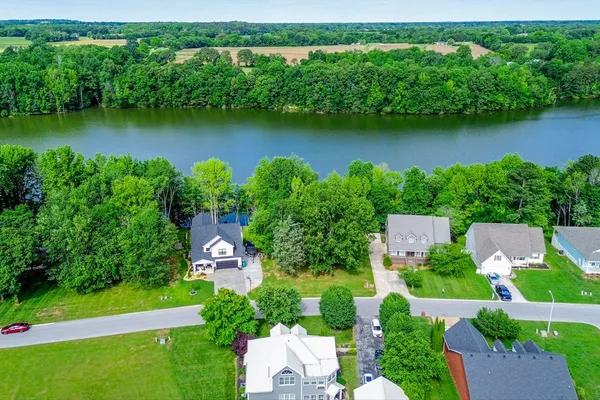 a view of a garden with a lake