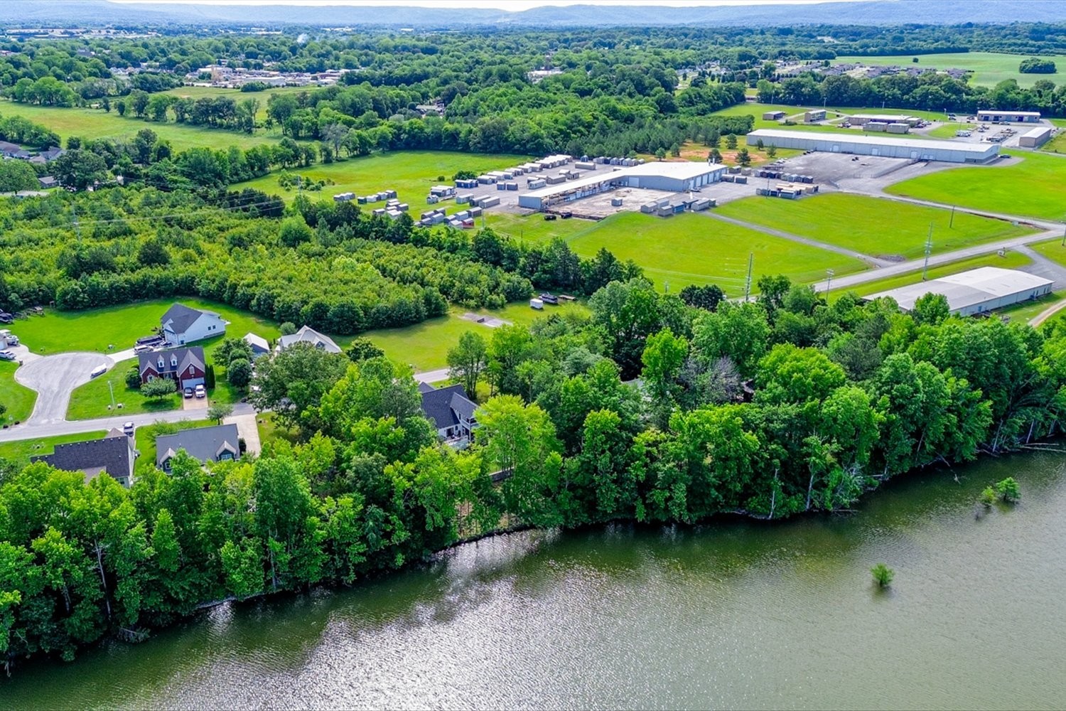 6 Cypress Point Drive Winchester, TN 37398 - Photo 36 of 58 an aerial view of a house with a garden and swimming pool