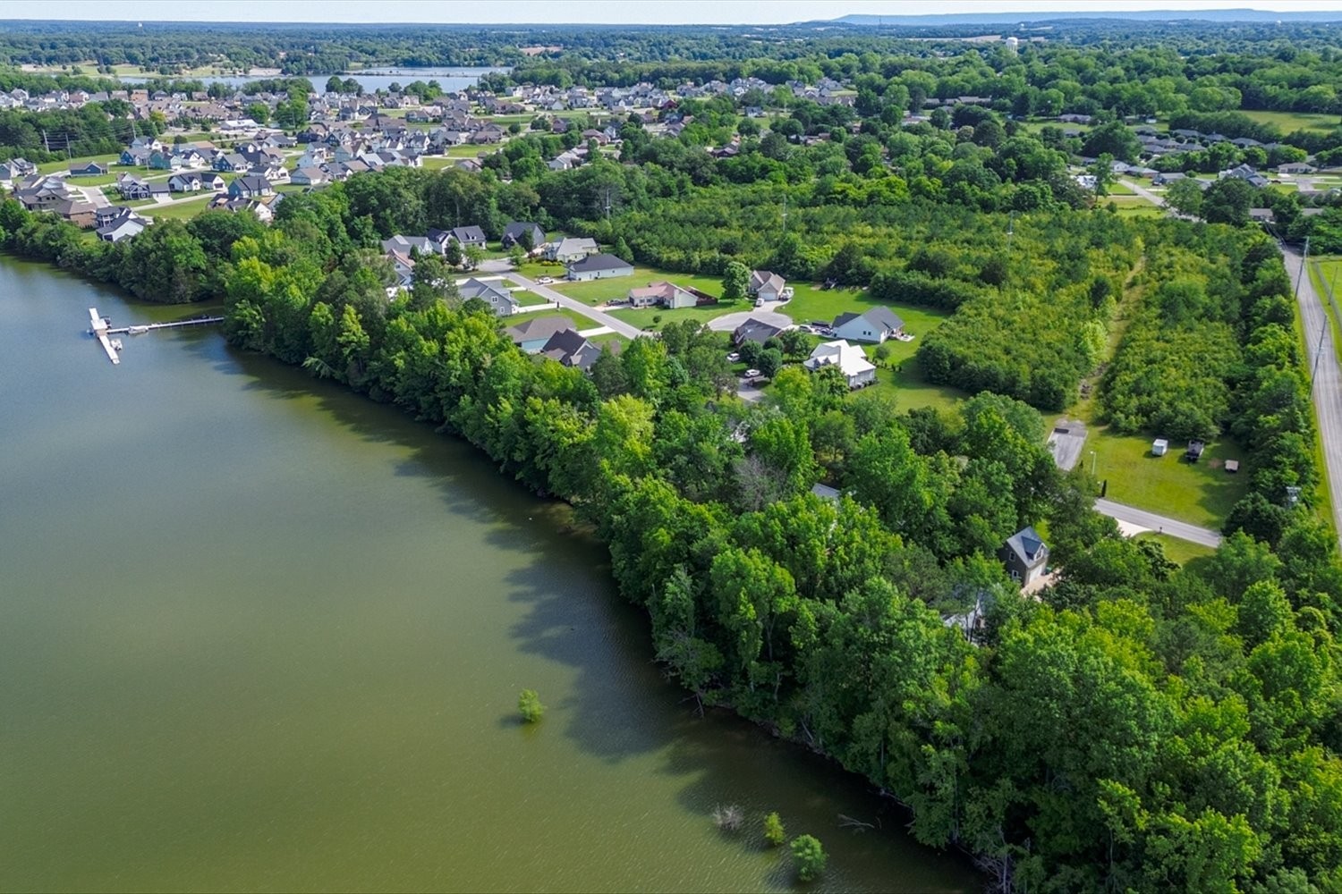 6 Cypress Point Drive Winchester, TN 37398 - Photo 39 of 58 a view of a garden with a lake