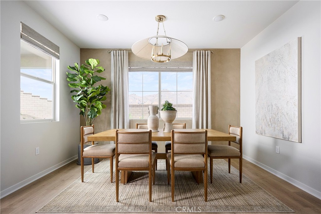 26147 Pepper Tree Ridge Road Corona, CA 92883 - Photo 3 of 14 Model Photos: Photos shown are of the model home for this floor plan. Actual finishes, features, and landscaping may vary.