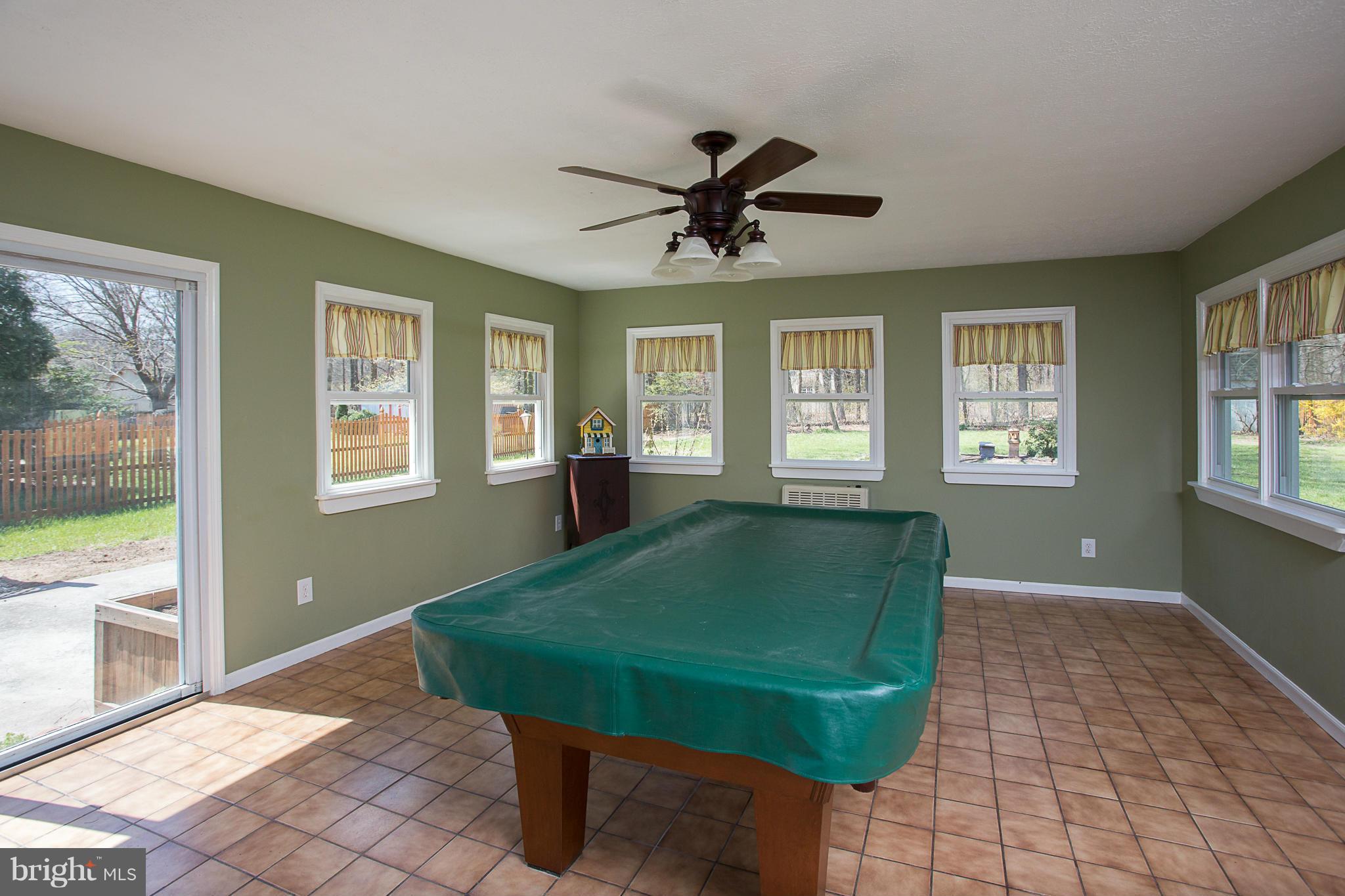 8208 Grassland Road Severn, MD 21144 - Photo 14 of 30 a living room with furniture and a window