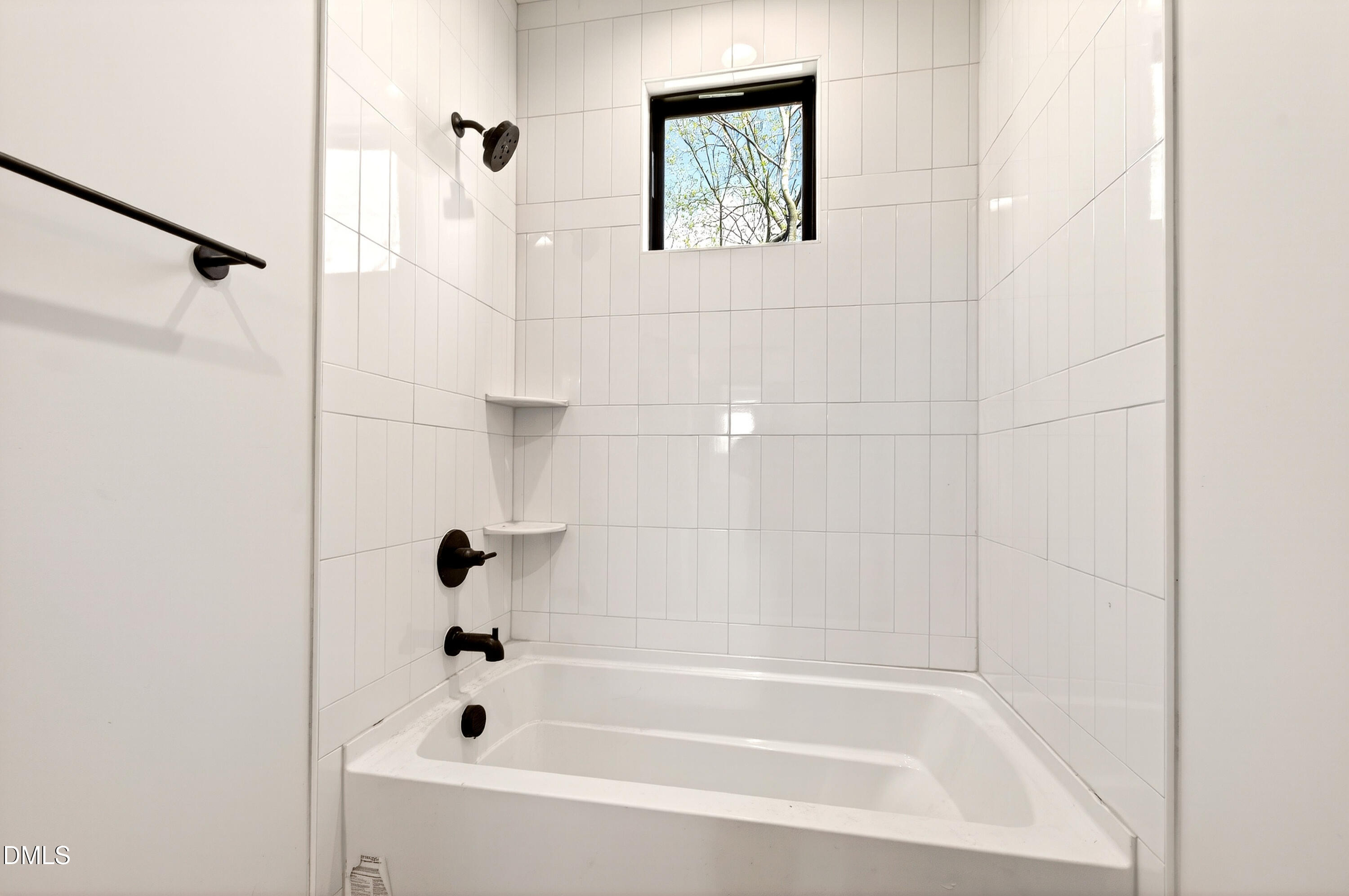 909 Oberlin Road Raleigh, NC 27605 - Photo 32 of 59 a bathroom with a shower
