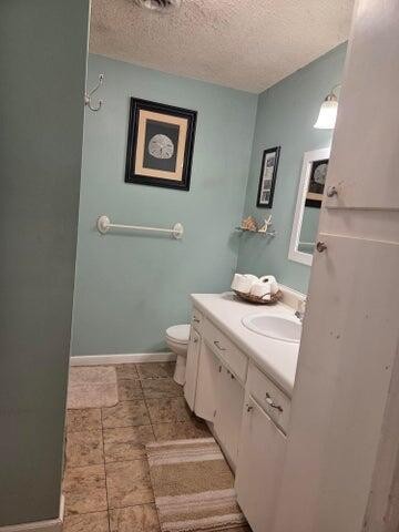 2596 Keith Valley Road Southeast Cleveland, TN 37323 - Photo 16 of 24 a bathroom with a sink a toilet and mirror