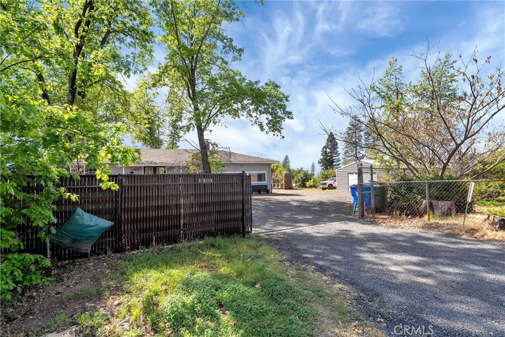 5805 Gradley Lane Paradise, CA 95969 - Photo 1 of 31 a view of street with wooden fence