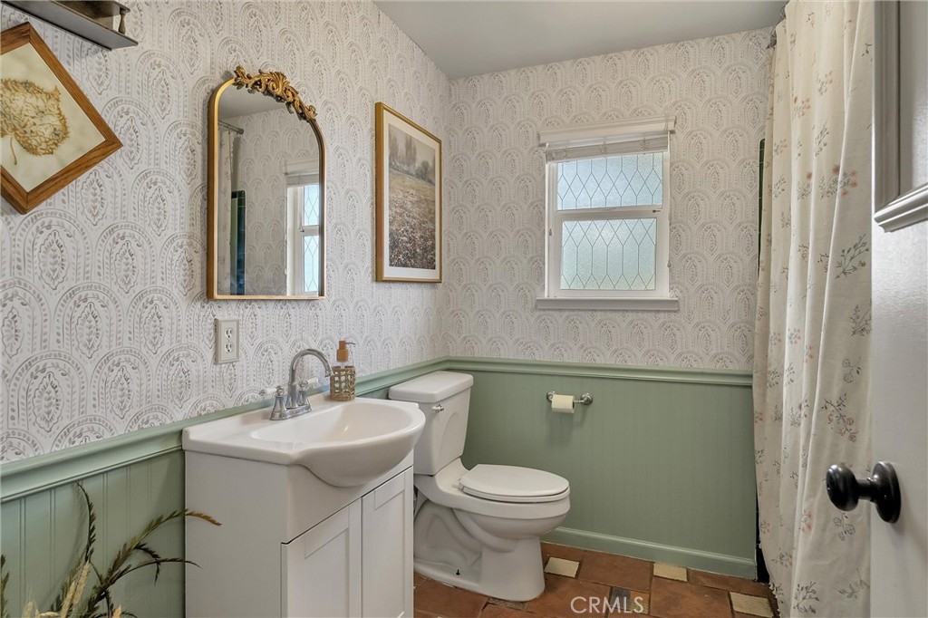5805 Gradley Lane Paradise, CA 95969 - Photo 16 of 31 a bathroom with a toilet sink and mirror