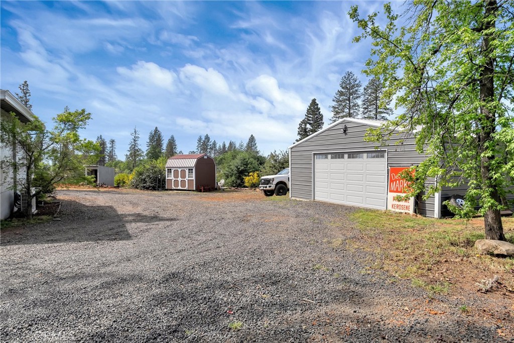 5805 Gradley Lane Paradise, CA 95969 - Photo 23 of 31 a view of a house with a yard and garage