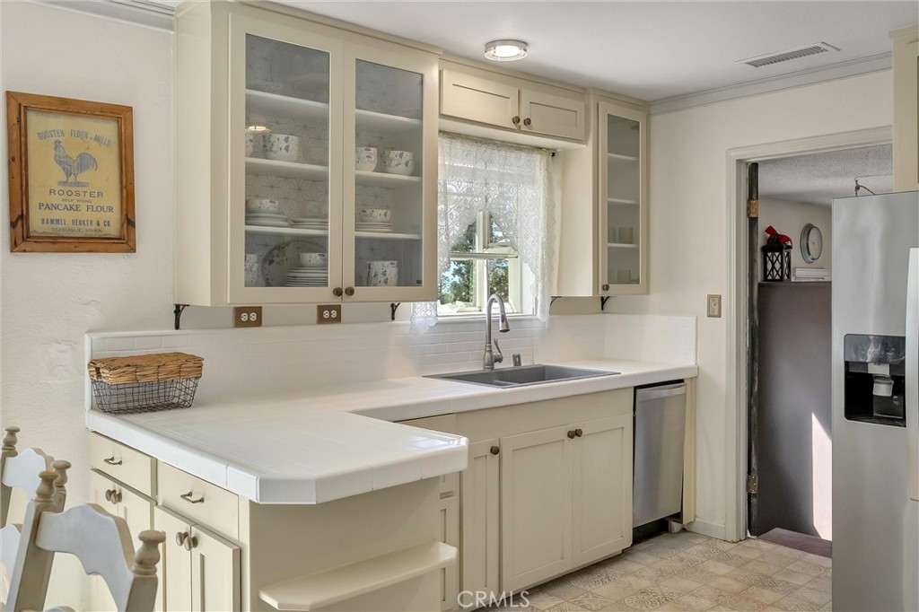 5805 Gradley Lane Paradise, CA 95969 - Photo 10 of 31 a kitchen with a sink cabinets and window