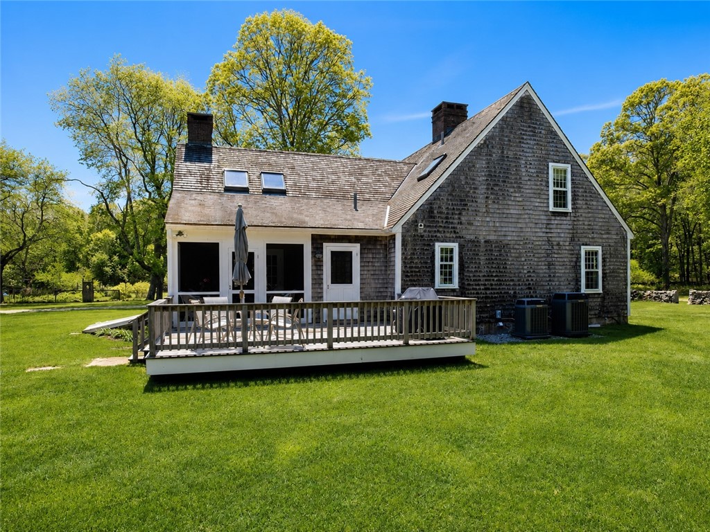 307 Stony Fort Road Saunderstown, RI 02874 - Photo 6 of 48 This deck is large enough for family gatherings