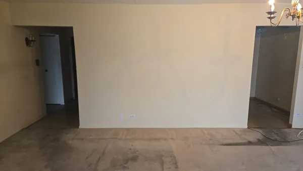 an empty room with a door