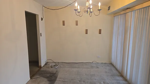 a kitchen with stainless steel appliances granite countertop a stove a refrigerator and a sink