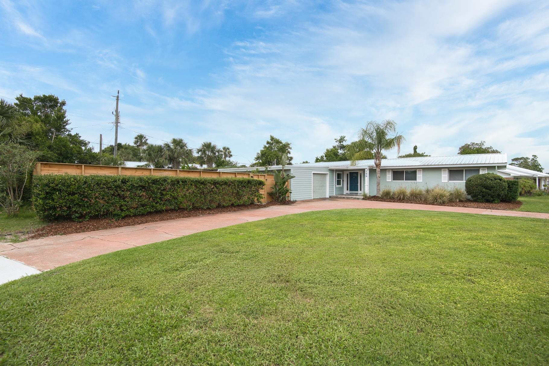 159 Southwind Circle St. Augustine, FL 32080 - Photo 2 of 36 a view of a garden