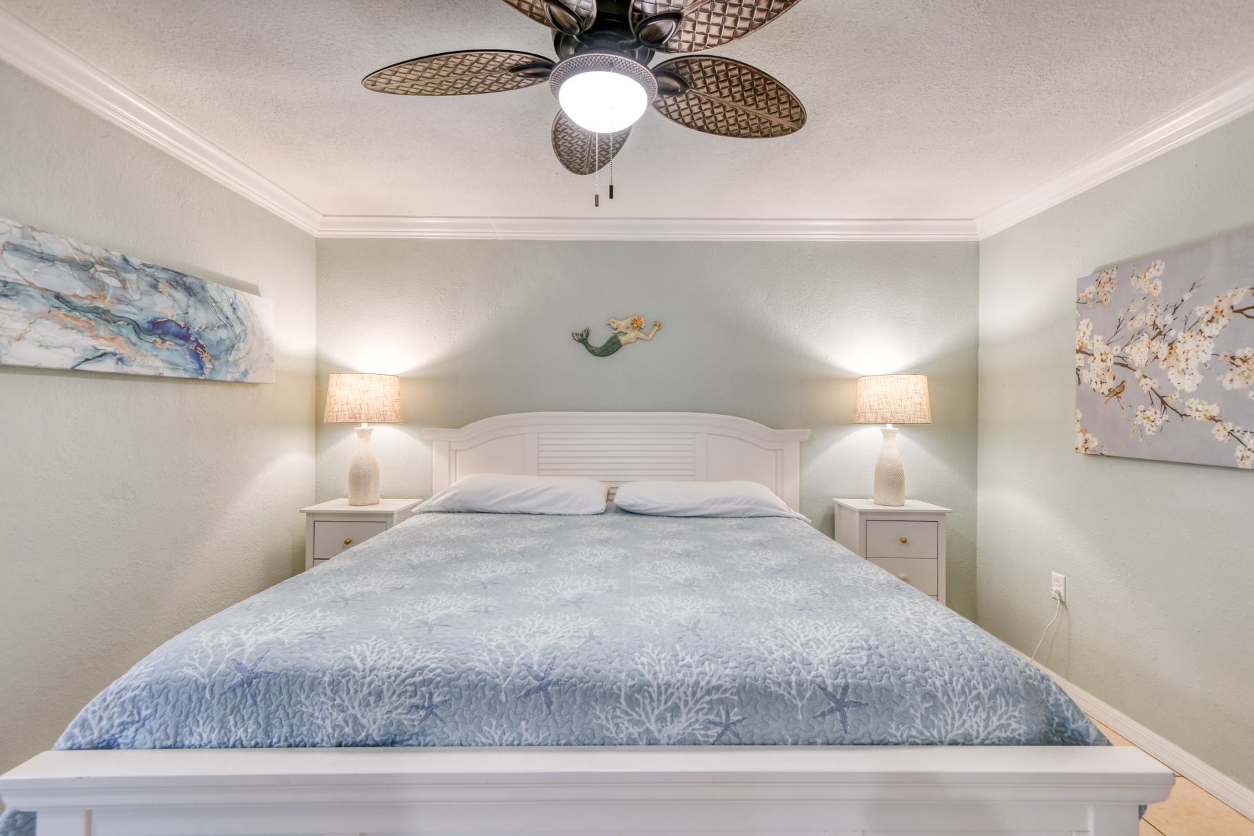 159 Southwind Circle St. Augustine, FL 32080 - Photo 25 of 36 a bedroom with a bed and painting on the wall