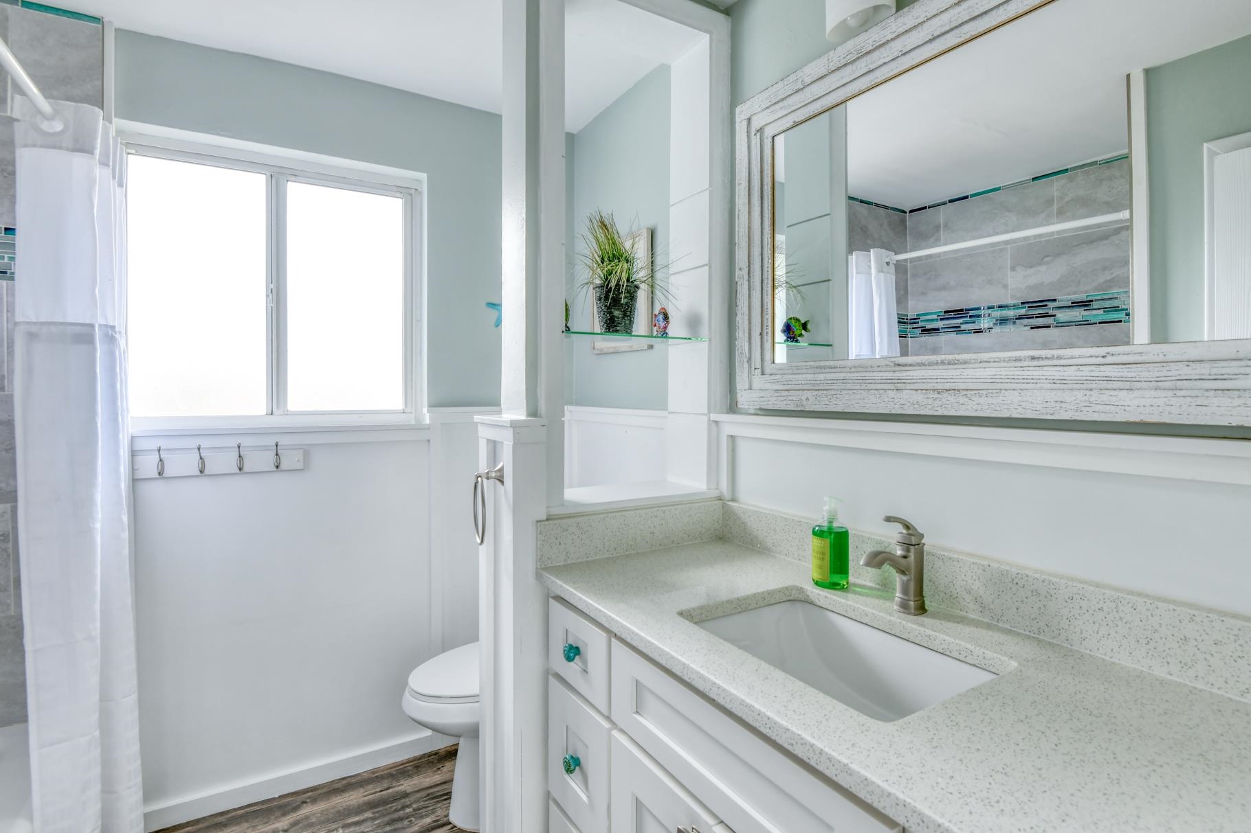 159 Southwind Circle St. Augustine, FL 32080 - Photo 30 of 36 a bathroom with a sink and toilet