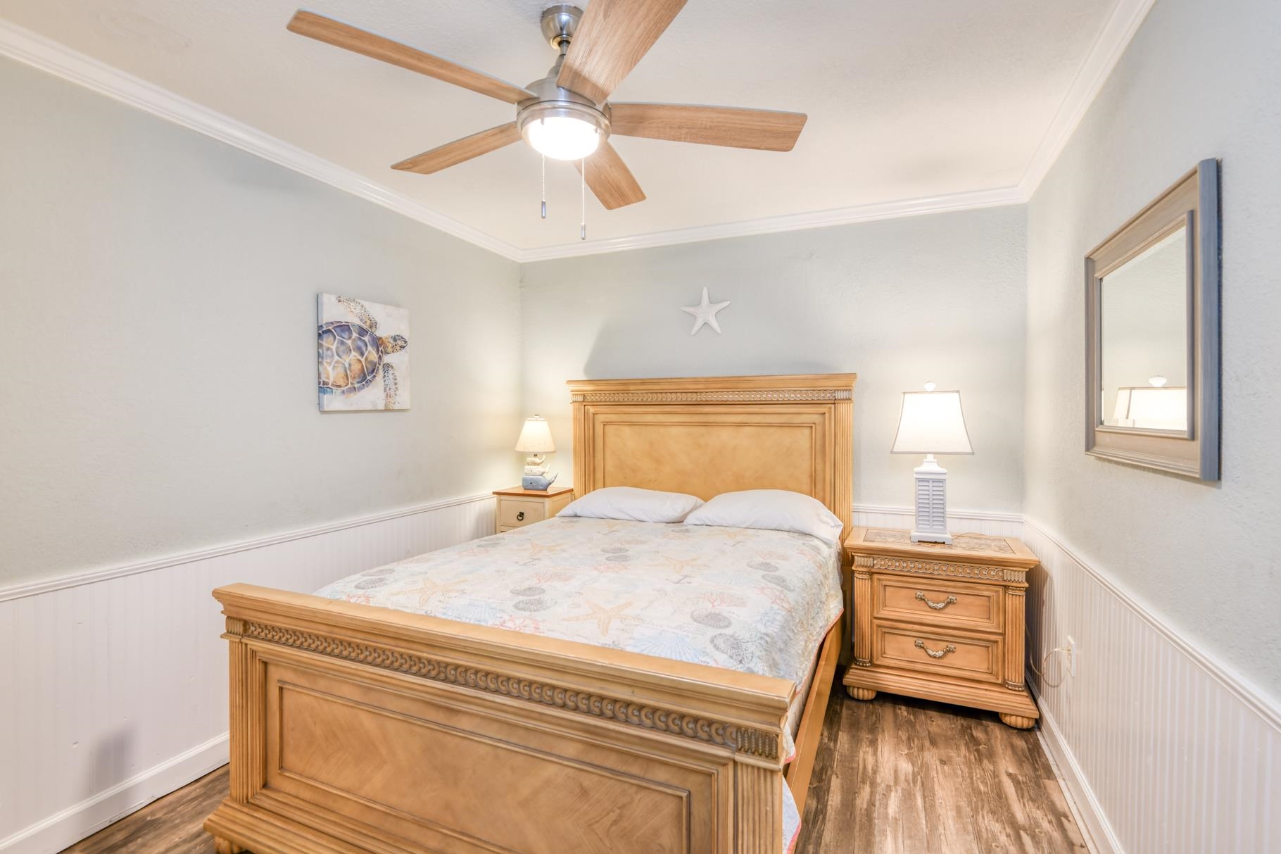 159 Southwind Circle St. Augustine, FL 32080 - Photo 32 of 36 a bedroom with a bed and wooden floor