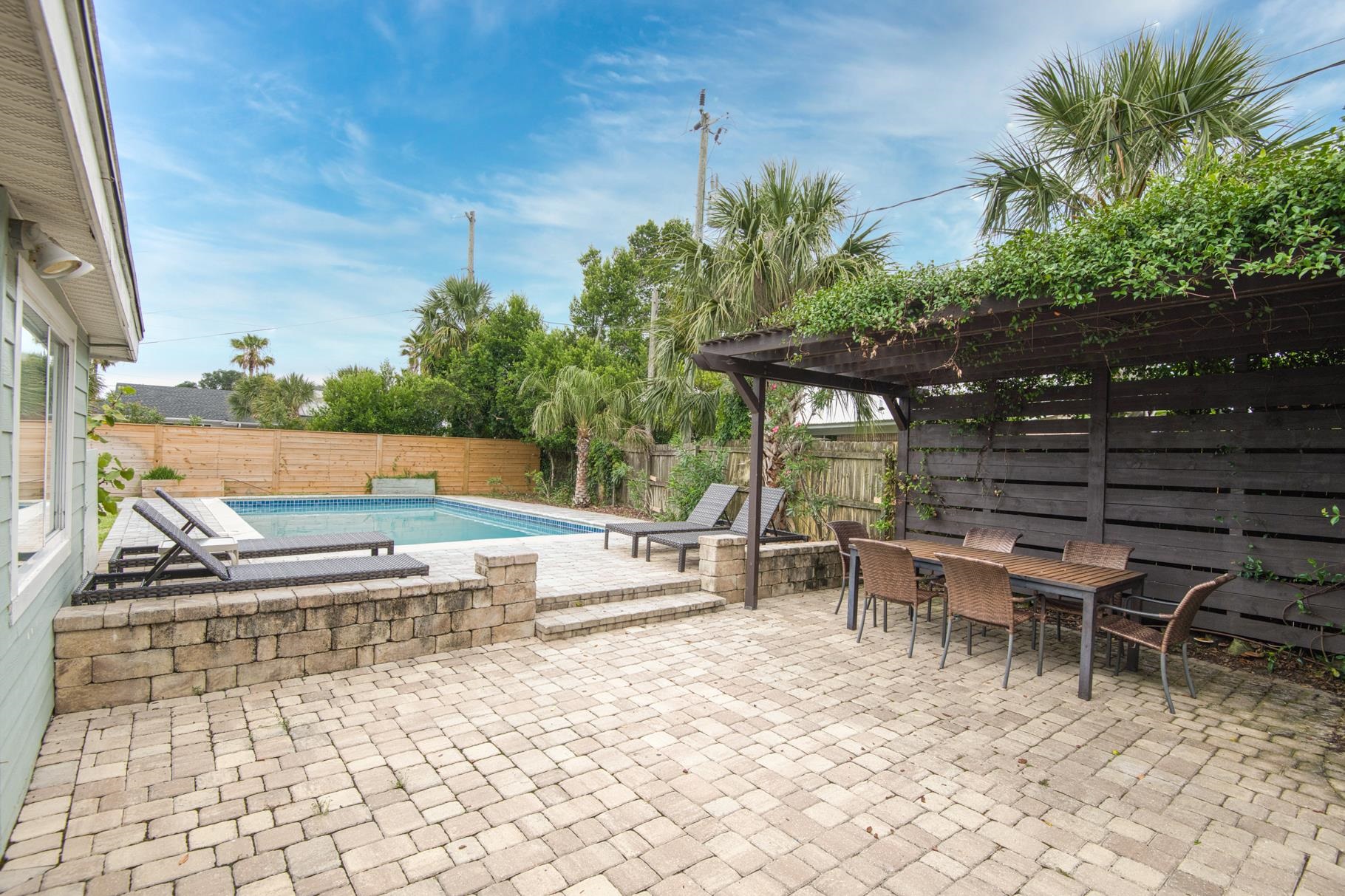 159 Southwind Circle St. Augustine, FL 32080 - Photo 6 of 36 a view of a chairs and table in the patio