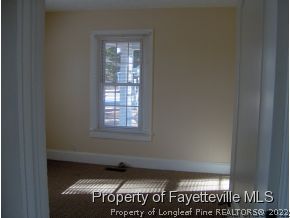 125 Reservation Road Aberdeen, NC 28315 - Photo 6 of 7 a view of an empty room and window