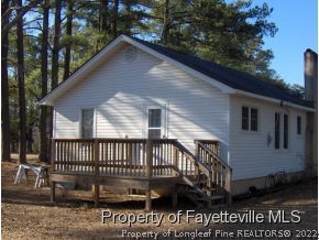 125 Reservation Road Aberdeen, NC 28315 - Photo 7 of 7 a view of a house with a yard