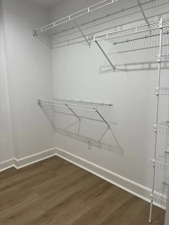 a view of a room with racks on the wall