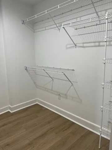 a view of a room with racks on the wall