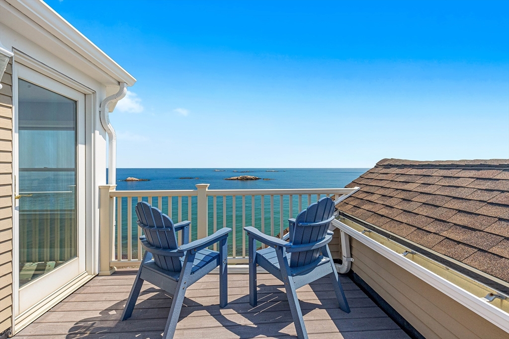 66 Glades Road, Unit 5 Scituate, MA 02066 - Photo 10 of 14 a view of a balcony with chairs