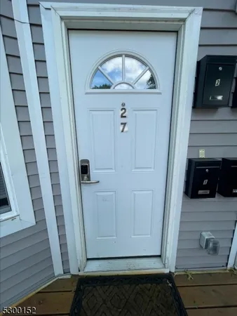 a bathroom with a window and shower