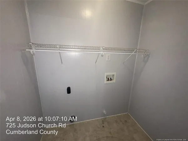 a view of a room with racks on the wall