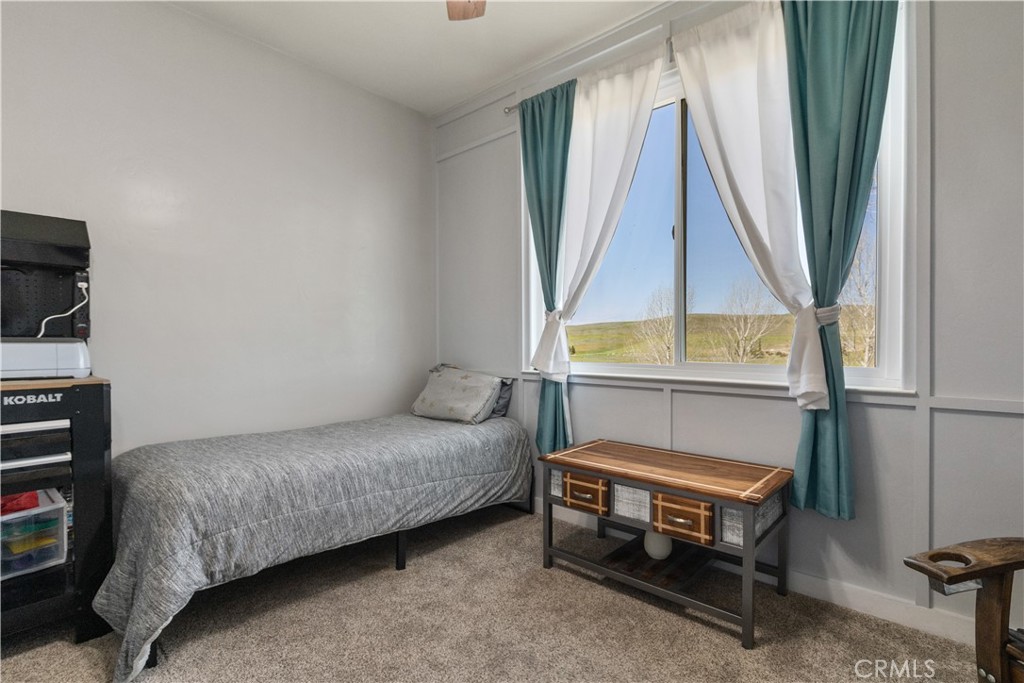 76870 Barker Road San Miguel, CA 93451 - Photo 30 of 66 a bedroom with a bed and a window