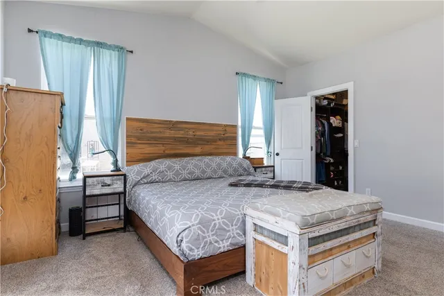 a view of a garage with storage and utility