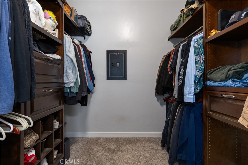 76870 Barker Road San Miguel, CA 93451 - Photo 34 of 66 a view of walk in closet with clothes and shoes