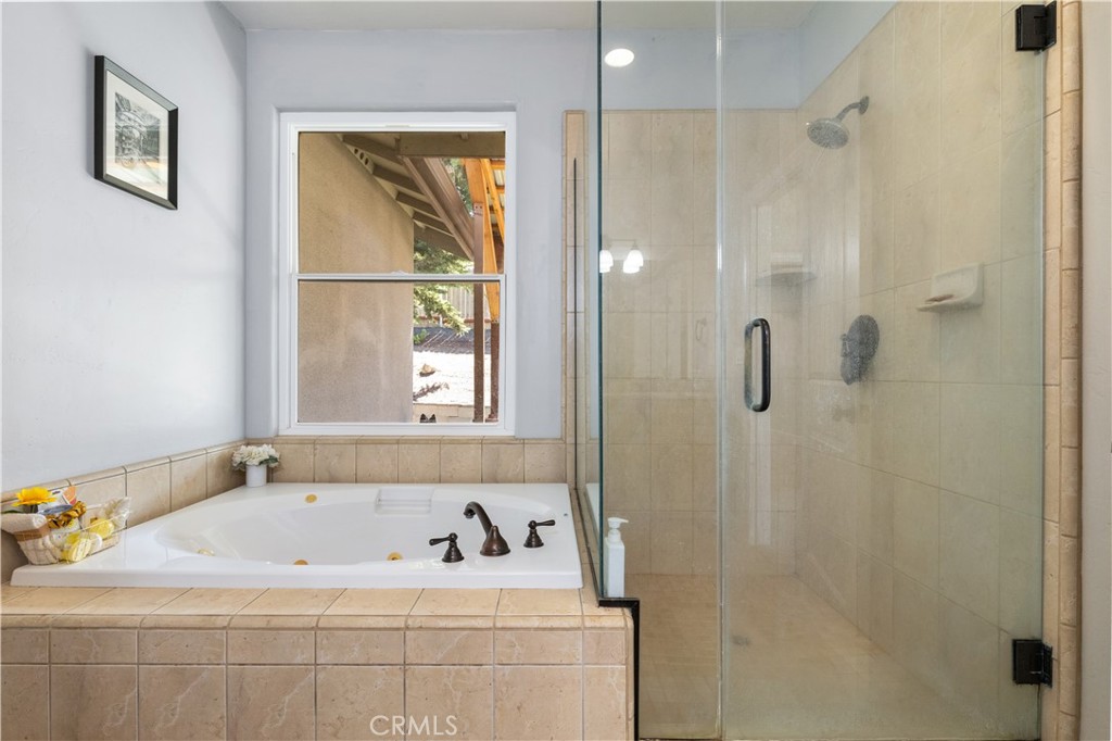 76870 Barker Road San Miguel, CA 93451 - Photo 37 of 66 a bathroom with a bathtub and a shower