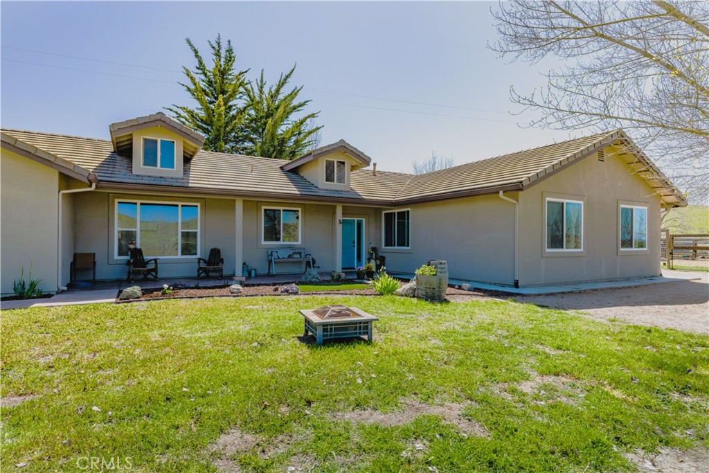 76870 Barker Road San Miguel, CA 93451 - Photo 4 of 66 a view of a house with swimming pool and sitting area