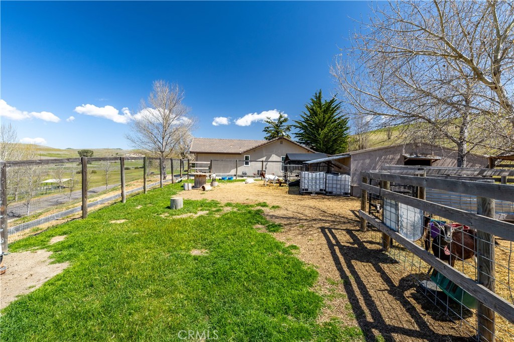 76870 Barker Road San Miguel, CA 93451 - Photo 48 of 66 a view of a house with backyard and sitting area