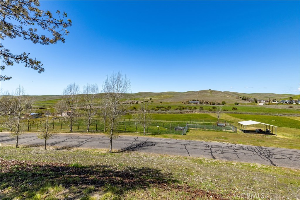 76870 Barker Road San Miguel, CA 93451 - Photo 56 of 66 a view of a lake with a mountain in the background