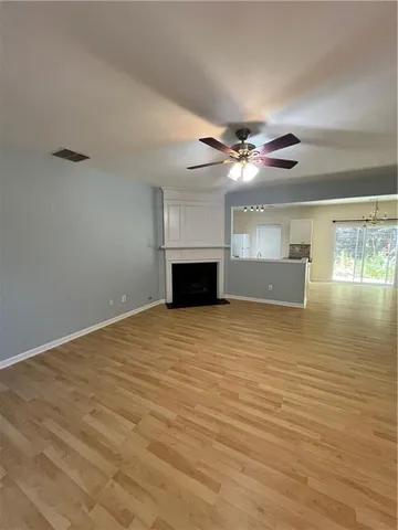 a view of a water heater room with a ceiling fan