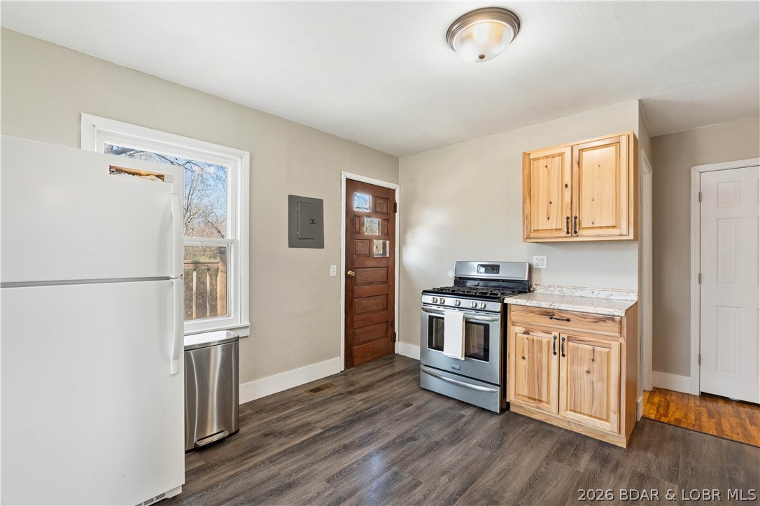 1598 Long Lane Eldon, MO 65026 - Photo 4 of 39 Loads of natural light in kitchen with solid wood