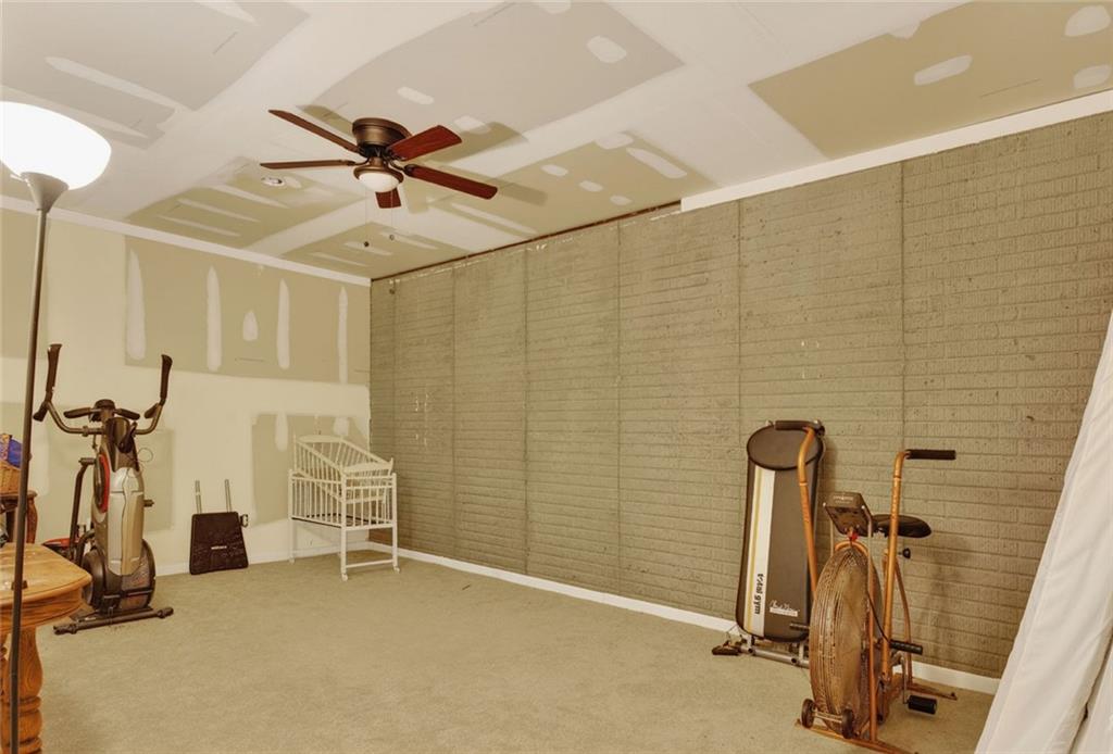 120 Norman Road Covington, GA 30014 - Photo 29 of 31 a view of a room with gym equipment