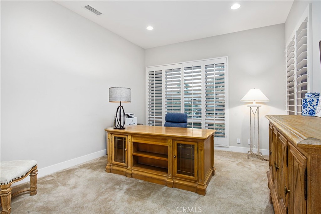 15 Via Montagna Rancho Mirage, CA 92270 - Photo 20 of 75 a bed room with a bed and a desk