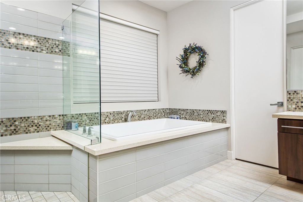 15 Via Montagna Rancho Mirage, CA 92270 - Photo 58 of 75 a bathroom with a sink and a bathtub