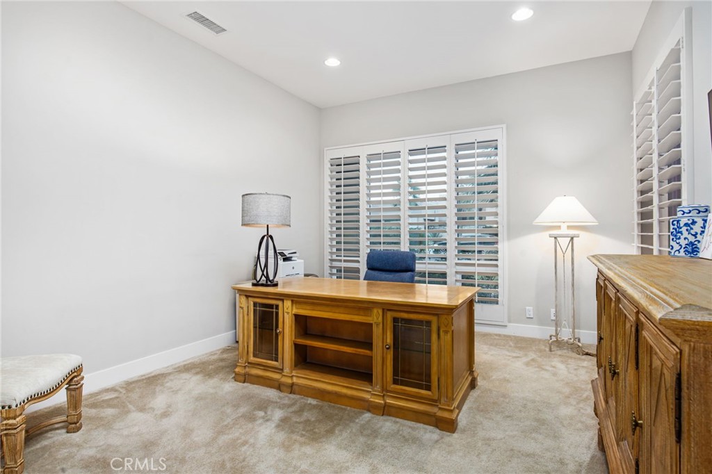 15 Via Montagna Rancho Mirage, CA 92270 - Photo 60 of 75 a bed room with a bed and a desk