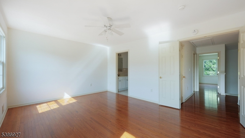 16 Riga Court Scotch Plains, NJ 07076 - Photo 19 of 33 a view of an empty room with wooden floor