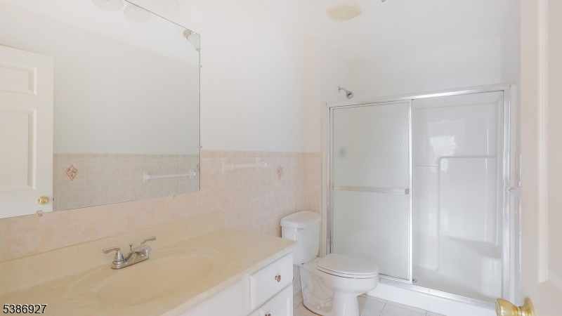 16 Riga Court Scotch Plains, NJ 07076 - Photo 21 of 33 a bathroom with a bathtub and a toilet