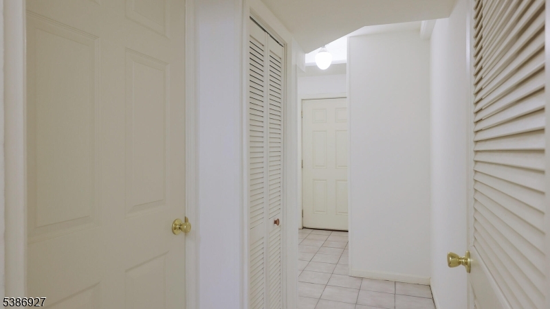 16 Riga Court Scotch Plains, NJ 07076 - Photo 26 of 33 a bathroom with a shower