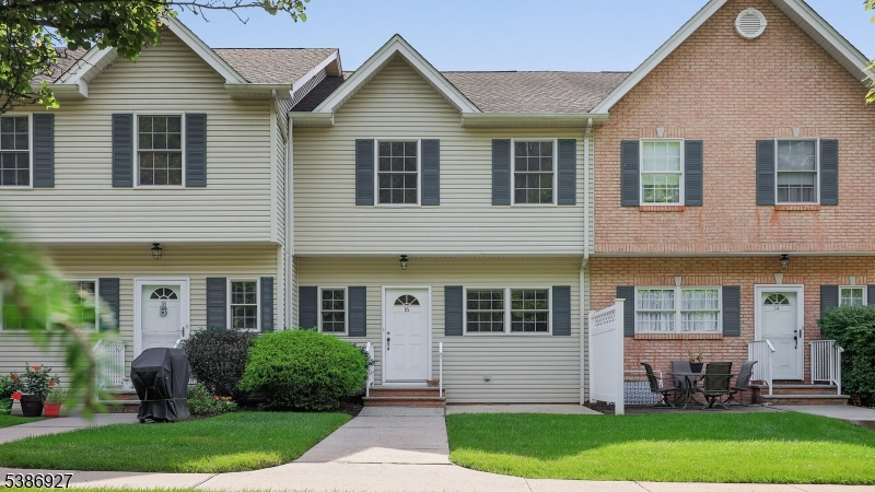 16 Riga Court Scotch Plains, NJ 07076 - Photo 3 of 33 a front view of a house with a yard