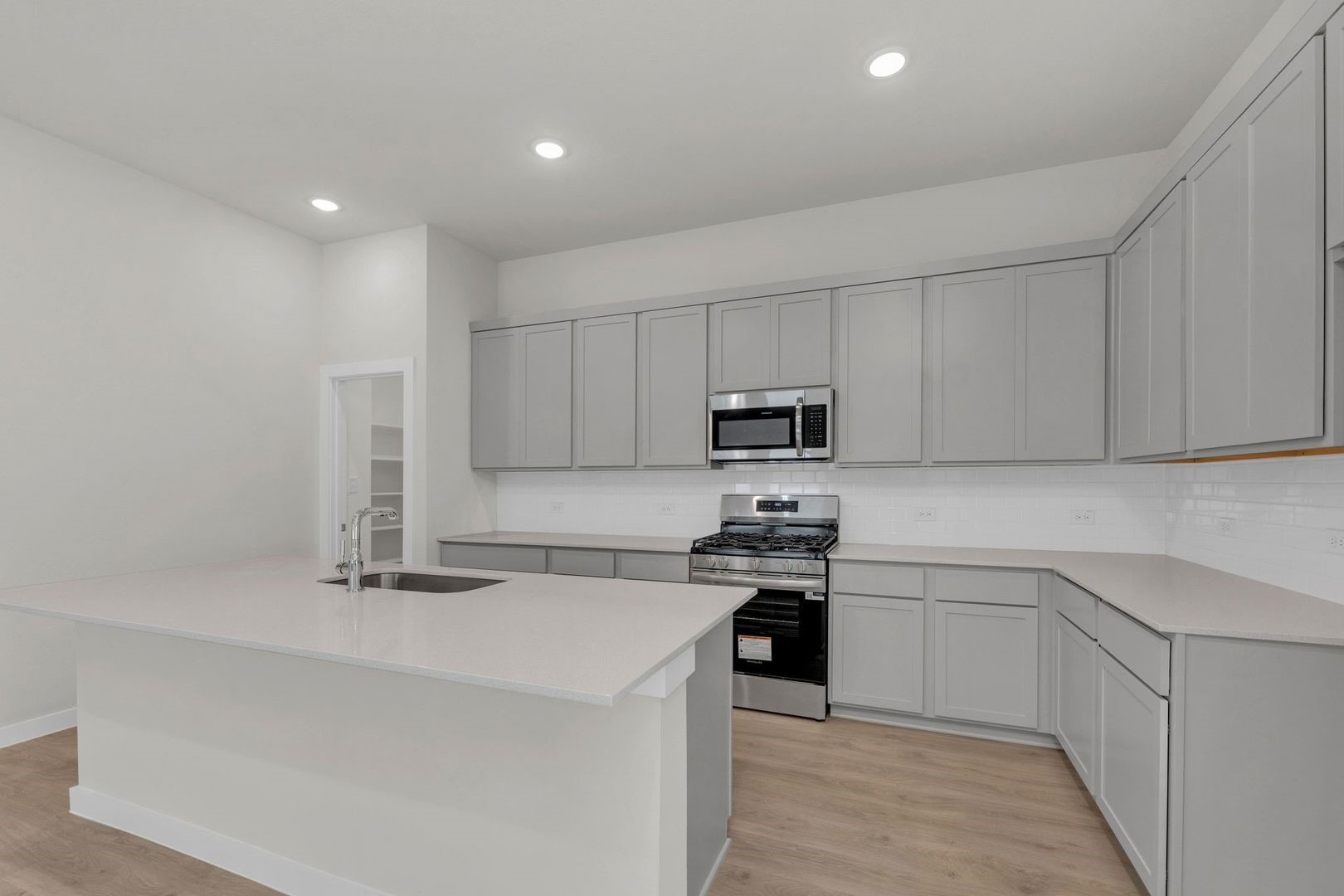 31104 Rena Coast Drive Huffman, TX 77336 - Photo 8 of 35 Kitchen in the Pecos home plan by Trophy Signature Homes – REPRESENTATIVE PHOTO