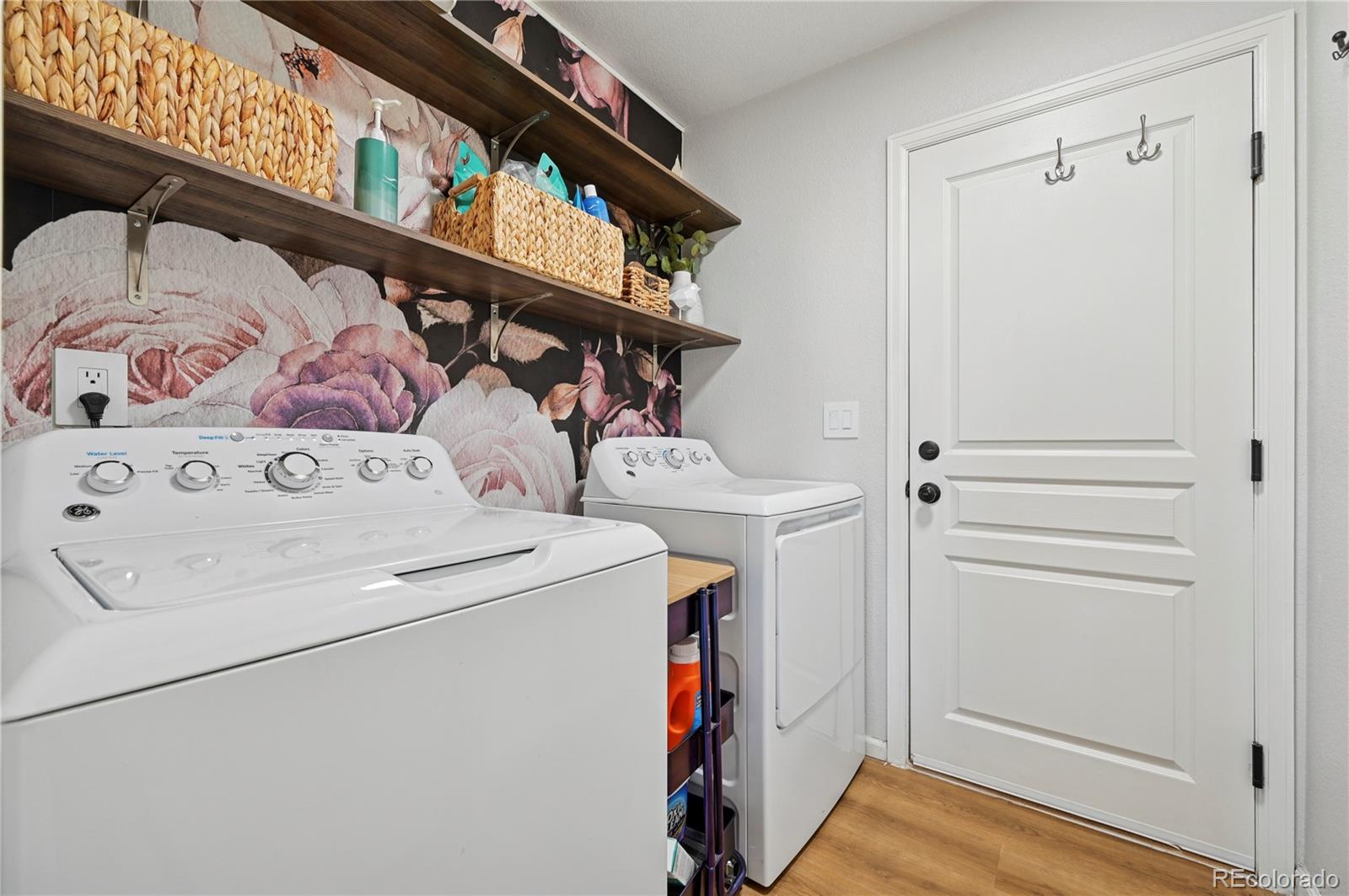 795 Winebrook Way Fountain, CO 80817 - Photo 16 of 41 a utility room with dryer and washer