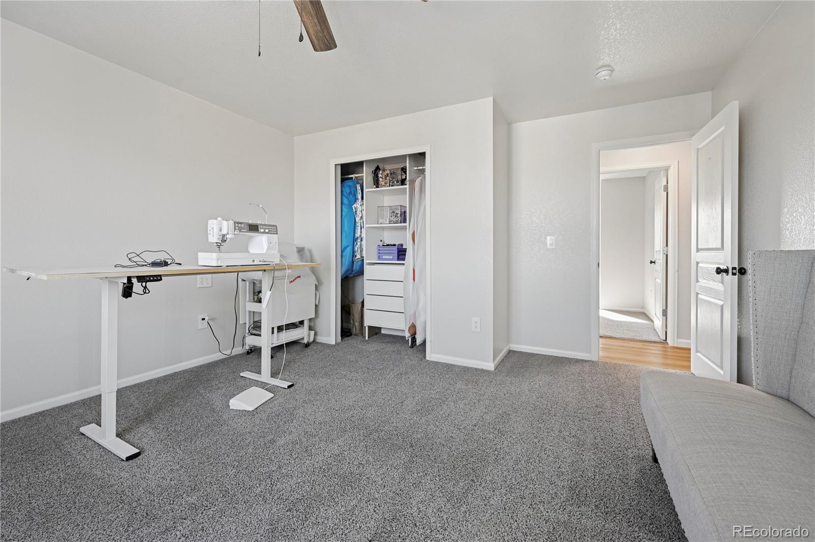 795 Winebrook Way Fountain, CO 80817 - Photo 23 of 41 an empty room with a door